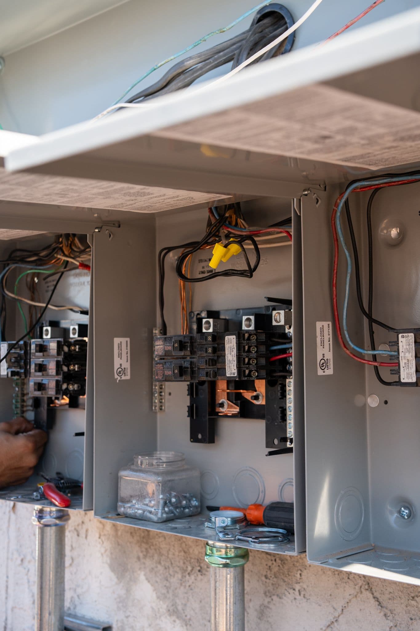 Three new open panels with neat breakers and UL labels